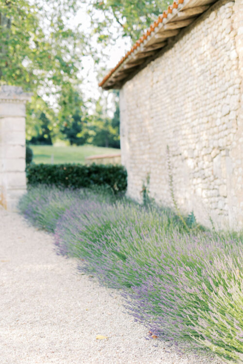 Romantic light and airy wedding photography at Château de Lerse in the Dordogne, France, during an elegant destination wedding.